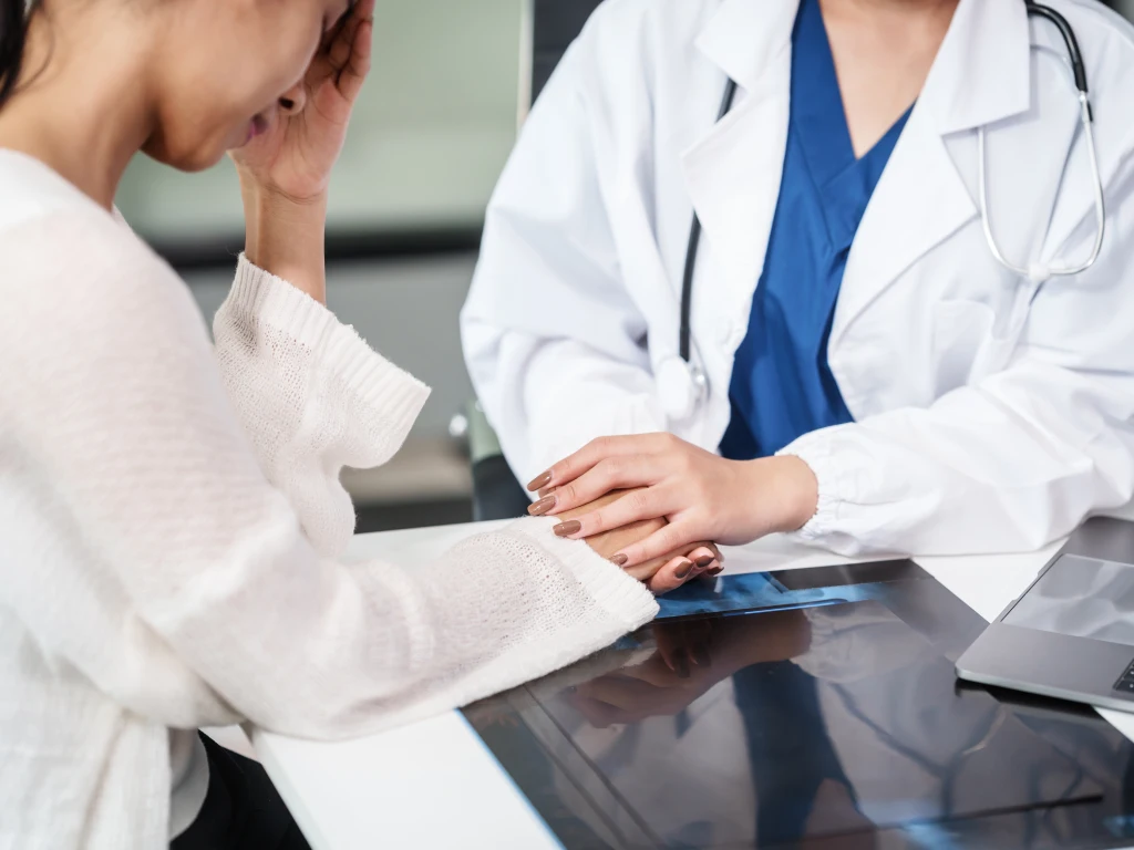Doctor discussing obsessive compulsive disorder with a patient